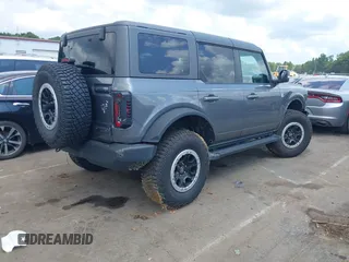 2024 Ford Bronco Outer Banks z VIN 1FMDE8BHXRLA40761, wystawiony jako IAAI lot #42704734 z przebiegiem 22 706 mil mil oraz . Historia ofert i sprzedaży dostępna na DreamBid. Obrazek 4.