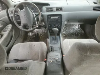 2000 Toyota Camry CE with VIN JT2BG22K6Y0471945, listed as a Copart auction lot 48932715 with Not Provided miles and Salvage Title. Bid and sale history available at DreamBid. Image 8.