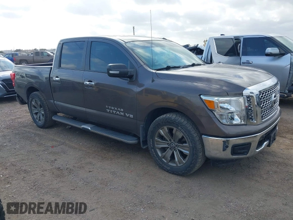 2018 Nissan Titan SV with VIN 1N6AA1E64JN502421, listed as a IAAI auction lot 40735048 with 71,256 mi miles and . Bid and sale history available at DreamBid. Image 1.