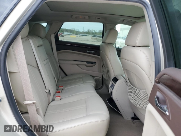 2015 Cadillac SRX Luxury Collection z VIN 3GYFNEE33FS606531, wystawiony jako Copart lot #53088485 z przebiegiem 115 140 mil mil oraz Szkody całkowita. Historia ofert i sprzedaży dostępna na DreamBid. Obrazek 11.