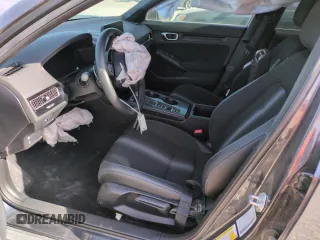 2023 Honda Civic Sport z VIN 2HGFE2F56PH566939, wystawiony jako Copart lot #52785115 z przebiegiem 21 653 mil mil oraz Szkoda całkowita • Salvage title. Historia ofert i sprzedaży dostępna na DreamBid. Obrazek 7.