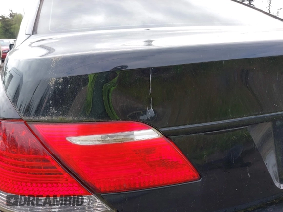 2006 BMW 7 Series 750i with VIN WBAHL83526DT06390, listed as a IAAI auction lot 42246688 with 123,962 mi miles and . Bid and sale history available at DreamBid. Image 6.