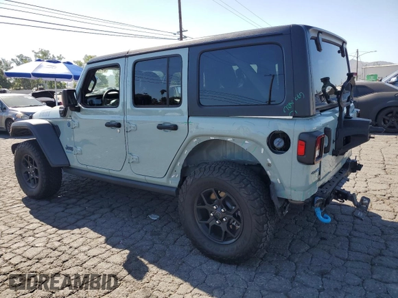 2024 Jeep Wrangler Sport S with VIN 1C4RJXN63RW142251, listed as a Copart auction lot 57103095 with 30,111 mi miles and Salvage title. Bid and sale history available at DreamBid. Image 2.