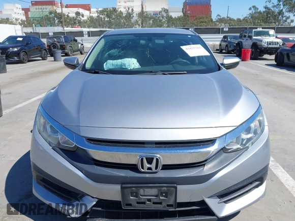 2017 Honda Civic LX z VIN 2HGFC2F5XHH572573, wystawiony jako IAAI lot #41825261 z przebiegiem 83 599 mil mil oraz . Historia ofert i sprzedaży dostępna na DreamBid. Obrazek 12.