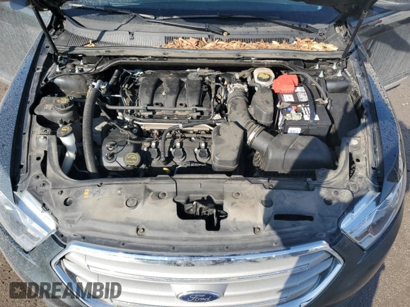 2016 Ford Taurus SEL with VIN 1FAHP2E85GG153683, listed as a Copart auction lot 46168965 with 72,769 mi miles and Salvage Title. Bid and sale history available at DreamBid. Image 12.