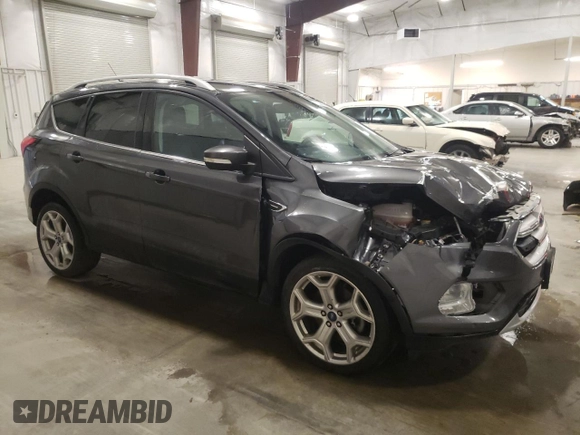 2019 Ford Escape Titanium z VIN 1FMCU9J93KUC54523, wystawiony jako Copart lot #53613665 z przebiegiem 140 895 mil mil oraz Szkoda całkowita • Salvage title. Historia ofert i sprzedaży dostępna na DreamBid. Obrazek 4.