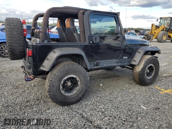 2004 Jeep Wrangler Rubicon with VIN 1J4FA69S54P769356, listed as a Copart auction lot 74089914 with 0 mi miles and Salvage Title. Bid and sale history available at carsss.com. Image 3.