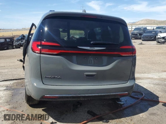 2022 Chrysler Pacifica Touring L z VIN 2C4RC1BG0NR168300, wystawiony jako Copart lot #57766004 z przebiegiem Nie podano mil oraz Nie do naprawy • Non repairable. Historia ofert i sprzedaży dostępna na DreamBid. Obrazek 6.
