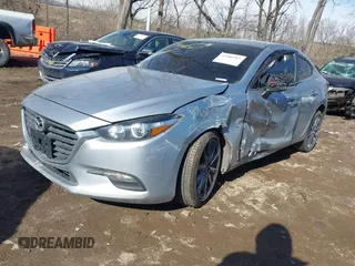 2018 Mazda 3 Touring z VIN 3MZBN1V36JM205904, wystawiony jako IAAI lot #41586707 z przebiegiem 145 401 mil mil oraz . Historia ofert i sprzedaży dostępna na DreamBid. Obrazek 16.