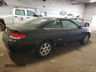 1999 Toyota Solara SE z VIN 2T1CF22P5XC230117, wystawiony jako Copart lot #57488925 z przebiegiem 282 366 mil mil oraz Czysty tytuł • Clean title. Historia ofert i sprzedaży dostępna na DreamBid. Obrazek 3.