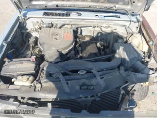 1990 Nissan Trucks 2WD XE with VIN 1N6SD11S4LC400985, listed as a IAAI auction lot 41986390 with 189,924 mi miles. Bid and sale history available at carsss.com. Image 10.
