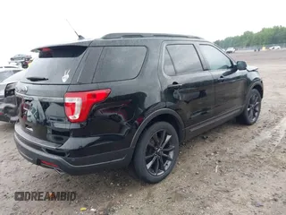 2018 Ford Explorer XLT z VIN 1FM5K7D87JGA56109, wystawiony jako IAAI lot #42423403 z przebiegiem 80 082 mil mil oraz . Historia ofert i sprzedaży dostępna na DreamBid. Obrazek 4.