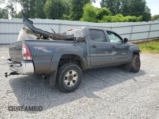 2010 Toyota Tacoma PreRunner with VIN 5TEJU4GN7AZ711911, listed as a Copart auction lot 60200385 with 209,579 mi miles and Salvage title. Bid and sale history available at DreamBid. Image 3.