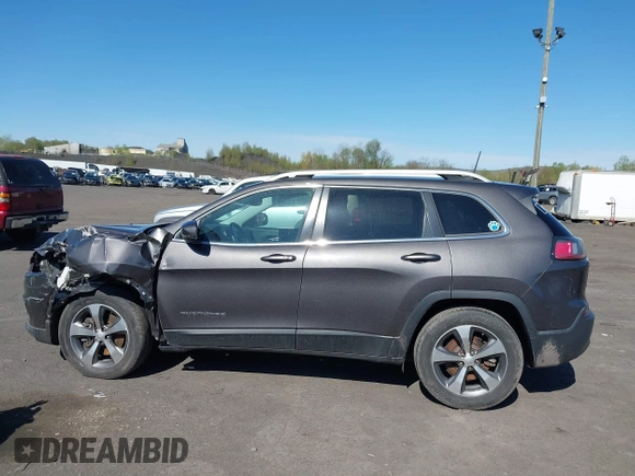 2019 Jeep Cherokee Limited with VIN 1C4PJMDX0KD319579, listed as a IAAI auction lot 42116163 with 94,013 mi miles. Bid and sale history available at carsss.com. Image 14.