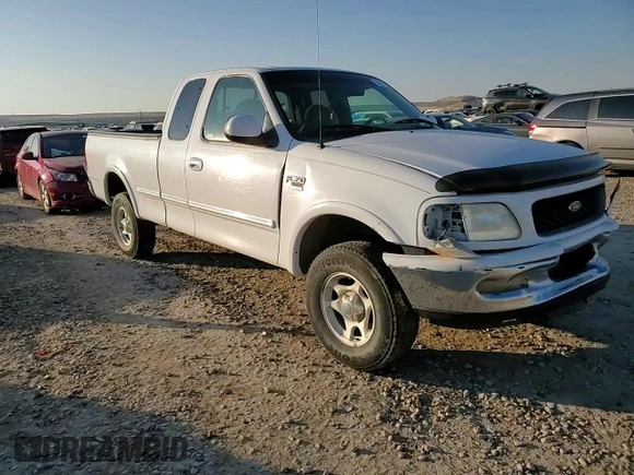 1998 Ford F-150 z VIN 1FTZX18W3WKB01774, wystawiony jako Copart lot #88670315 z przebiegiem 102 301 mil mil oraz Szkoda całkowita • Salvage title. Historia ofert i sprzedaży dostępna na DreamBid. Obrazek 10.
