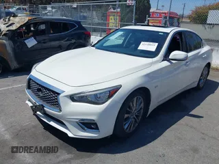 2019 Infiniti Q50 Luxe z VIN JN1EV7AP7KM518276, wystawiony jako IAAI lot #42148033 z przebiegiem 56 720 mil mil oraz . Historia ofert i sprzedaży dostępna na DreamBid. Obrazek 18.