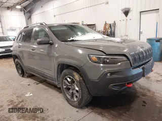 2019 Jeep Cherokee Trailhawk Elite with VIN 1C4PJMBX7KD361203, listed as a IAAI auction lot 41515943 with 133,384 mi miles. Bid and sale history available at carsss.com. Image 1.