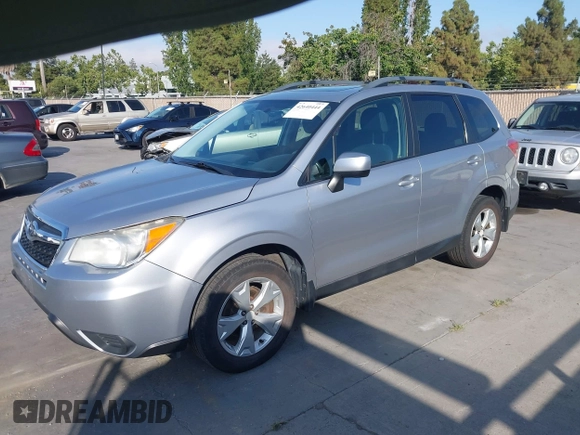 2014 Subaru Forester Premium with VIN JF2SJAEC5EH551632, listed as a IAAI auction lot 42640444 with 240,591 mi miles and . Bid and sale history available at DreamBid. Image 2.