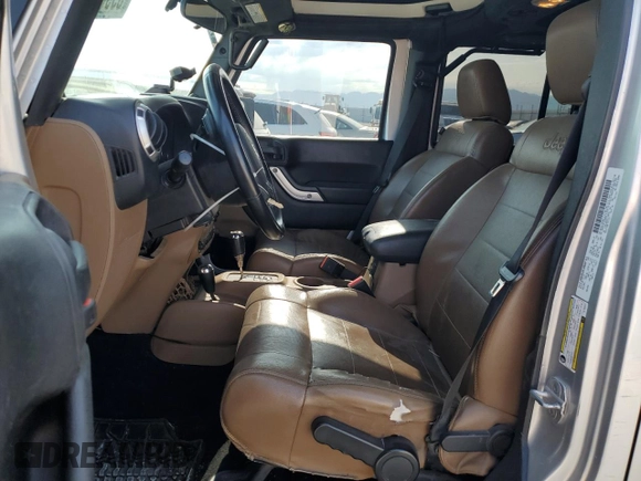 2012 Jeep Wrangler Unlimited Sahara z VIN 1C4HJWEG4CL159731, wystawiony jako Copart lot #59968695 z przebiegiem 111 918 mil mil oraz Szkoda całkowita • Salvage title. Historia ofert i sprzedaży dostępna na DreamBid. Obrazek 7.