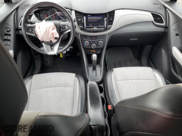 2020 Chevrolet Trax LT z VIN 3GNCJLSB9LL112868, wystawiony jako Copart lot #51441645 z przebiegiem 38 502 mil mil oraz Szkody całkowita. Historia ofert i sprzedaży dostępna na DreamBid. Obrazek 8.