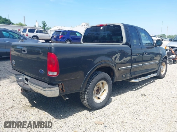 1998 Ford F-150 with VIN 1FTZX1762WNB88647, listed as a IAAI auction lot 42682271 with 187,520 mi miles and . Bid and sale history available at DreamBid. Image 4.