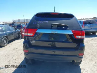 2013 Jeep Grand Cherokee Laredo with VIN 1C4RJFAG2DC643926, listed as a IAAI auction lot 41723575 with 125,048 mi miles. Bid and sale history available at carsss.com. Image 16.