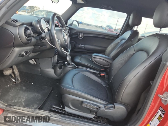 2015 MINI Hardtop with VIN WMWXM5C59FT939742, listed as a Copart auction lot 63778555 with 110,428 mi miles and Salvage title. Bid and sale history available at DreamBid. Image 7.
