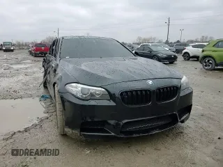 2014 BMW M5 z VIN WBSFV9C59ED097862, wystawiony jako Copart lot #85719684 z przebiegiem Nie podano mil oraz Szkody całkowita. Historia ofert i sprzedaży dostępna na DreamBid. Obrazek 11.