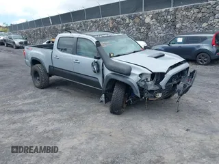2018 Toyota Tacoma SR5 with VIN 3TMDZ5BN3JM039497, listed as a IAAI auction lot 42326823 with 92,977 mi miles and . Bid and sale history available at DreamBid. Image 1.