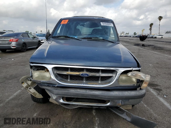 1998 Ford Explorer XL z VIN 1FMZU34EXWZA13244, wystawiony jako Copart lot #54456095 z przebiegiem 192 527 mil mil oraz Szkoda całkowita • Salvage title. Historia ofert i sprzedaży dostępna na DreamBid. Obrazek 5.