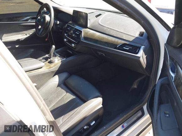 2020 BMW 5 Series 530e with VIN WBAJA9C02LCD31800, listed as a IAAI auction lot 41669765 with 99,024 mi miles and . Bid and sale history available at DreamBid. Image 5.