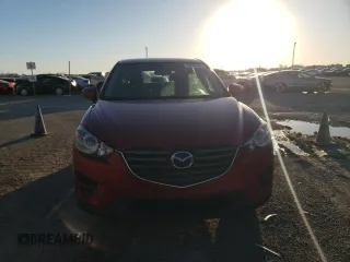 2016 Mazda CX-5 Sport with VIN JM3KE2BYXG0805613, listed as a Copart auction lot 86968884 with 114,524 mi miles and Clean Title. Bid and sale history available at carsss.com. Image 5.