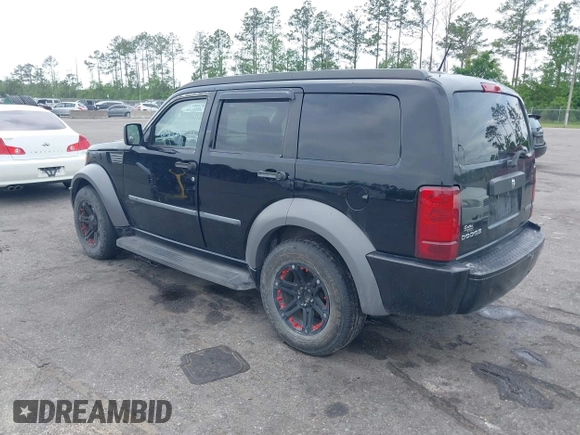2007 Dodge Nitro SXT with VIN 1D8GT28K17W605984, listed as a IAAI auction lot 41970841 with 118,700 mi miles. Bid and sale history available at carsss.com. Image 3.