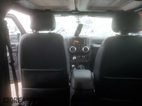 2014 Jeep Wrangler Rubicon with VIN 1C4BJWCG9EL189819, listed as a Copart auction lot 80522204 with 82,083 mi miles and Salvage title. Bid and sale history available at DreamBid. Image 8.