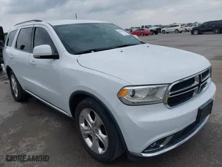 2014 Dodge Durango Limited with VIN 1C4RDHDG2EC318144, listed as a IAAI auction lot 41712791 with 124,569 mi miles. Bid and sale history available at carsss.com. Image 1.