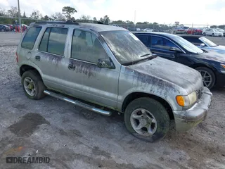2001 Kia Sportage with VIN KNDJB723115706221, listed as a IAAI auction lot 41562713 with 99,378 mi miles. Bid and sale history available at carsss.com. Image 1.