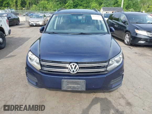 2015 Volkswagen Tiguan S z VIN WVGBV7AX8FW503114, wystawiony jako IAAI lot #42397033 z przebiegiem 200 658 mil mil oraz . Historia ofert i sprzedaży dostępna na DreamBid. Obrazek 12.