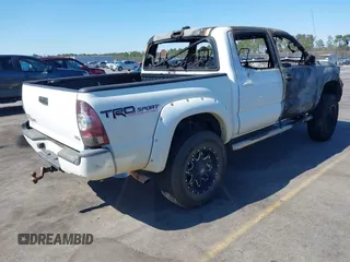 2014 Toyota Tacoma with VIN 5TFLU4EN0EX098815, listed as a IAAI auction lot 41675606 with 89,365 mi miles. Bid and sale history available at carsss.com. Image 4.