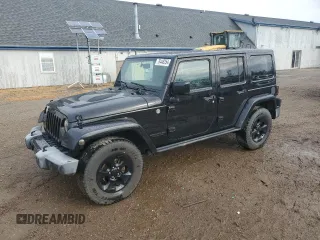2015 Jeep Wrangler Unlimited Altitude with VIN 1C4HJWEG1FL703736, listed as a Copart auction lot 78448254 with 148,264 mi miles and Clean title. Bid and sale history available at DreamBid. Image 1.