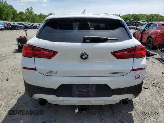 2018 BMW X2 xDrive28i z VIN WBXYJ5C35JEF80889, wystawiony jako Copart lot #57624455 z przebiegiem 80 012 mil mil oraz Szkoda całkowita • Salvage title. Historia ofert i sprzedaży dostępna na DreamBid. Obrazek 6.