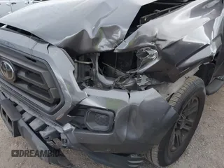 2022 Toyota Tacoma SR with VIN 3TYAX5GN8NT066318, listed as a IAAI auction lot 41739981 with 50,186 mi miles and . Bid and sale history available at DreamBid. Image 6.