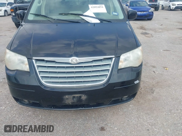 2010 Chrysler Town & Country Touring with VIN 2A4RR5D13AR155611, listed as a IAAI auction lot 42094894 with 132,966 mi miles. Bid and sale history available at carsss.com. Image 6.