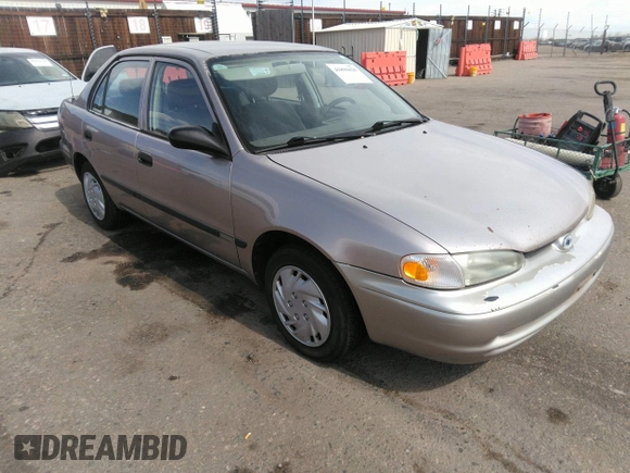 1998 Chevrolet Prizm Lsi z VIN 1Y1SK5285WZ438757, wystawiony jako IAAI lot #41896020 z przebiegiem 106 369 mil mil oraz . Historia ofert i sprzedaży dostępna na DreamBid. Obrazek 1.