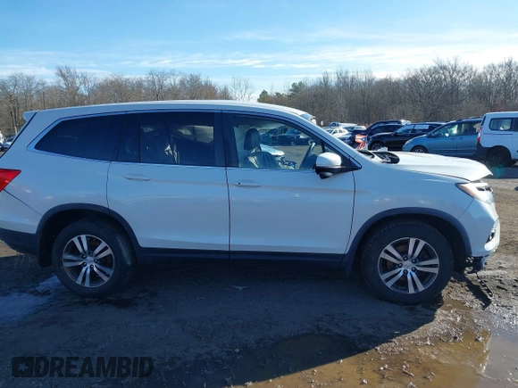2017 Honda Pilot EX with VIN 5FNYF6H31HB051328, listed as a IAAI auction lot 41598959 with 37,799 mi miles and . Bid and sale history available at DreamBid. Image 12.