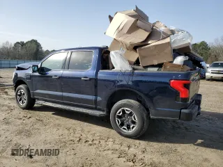 2022 Ford F-150 Lightning Pro с VIN 1FTVW1EL6NWG04931, выставлен на аукционе Copart как лот 43184675 с пробегом 26 616 миль миль и Списание • Salvage title. История ставок и продаж доступна на DreamBid. Изображение 2.