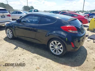 2012 Hyundai Veloster w/Black Int with VIN KMHTC6AD0CU056828, listed as a IAAI auction lot 42611623 with 136,242 mi miles and . Bid and sale history available at DreamBid. Image 3.