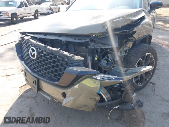 2023 Mazda CX-50 2.5 Turbo with VIN 7MMVABXY5PN120917, listed as a IAAI auction lot 42431995 with 34,421 mi miles and . Bid and sale history available at DreamBid. Image 12.