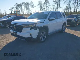 2023 Honda Pilot EX-L z VIN 5FNYG1H53PB030948, wystawiony jako IAAI lot #41298079 z przebiegiem 23 262 mil mil oraz . Historia ofert i sprzedaży dostępna na DreamBid. Obrazek 17.