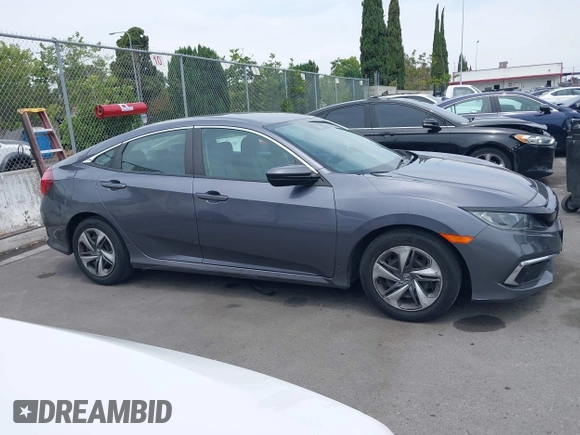 2020 Honda Civic LX z VIN 2HGFC2F60LH596396, wystawiony jako IAAI lot #42354812 z przebiegiem 62 082 mil mil oraz . Historia ofert i sprzedaży dostępna na DreamBid. Obrazek 13.