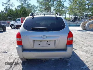 2006 Hyundai Tucson GL with VIN KM8JM12BX6U249982, listed as a IAAI auction lot 41976033 with 107,153 mi miles. Bid and sale history available at carsss.com. Image 16.